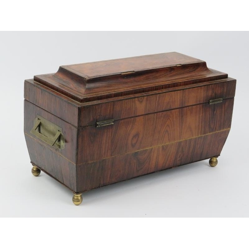 54 - A boxwood strung rosewood sarcophagus tea caddy, early 19th century. With a fitted interior incorpor... 