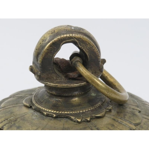 58 - A brass temple bell, Nepal/Tibet, 19th century or possibly earlier. The temple / monastery bell with... 