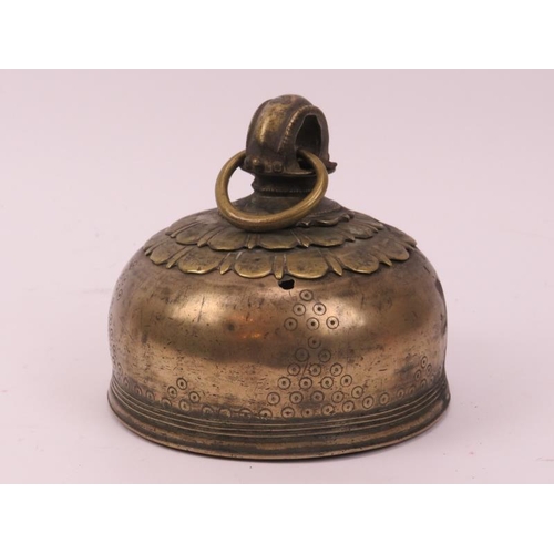 58 - A brass temple bell, Nepal/Tibet, 19th century or possibly earlier. The temple / monastery bell with... 