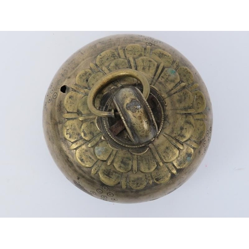 58 - A brass temple bell, Nepal/Tibet, 19th century or possibly earlier. The temple / monastery bell with... 