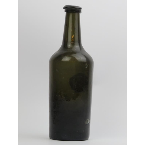 8 - A Georgian English cylindrical green glass bottle with seal, late 18th/early 19th century. Seal bear... 