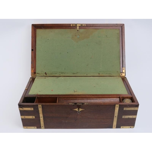 98 - A mahogany brass bound campaign writing slope with a fitted interior and hidden compartment, 19th ce... 