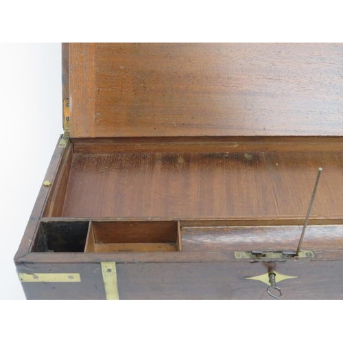 98 - A mahogany brass bound campaign writing slope with a fitted interior and hidden compartment, 19th ce... 