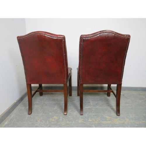 706 - A pair of 19th century style mahogany library chairs in the Gainsborough taste, upholstered in butto... 