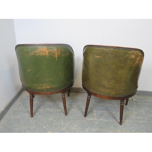 710 - A pair of antique mahogany library tub chairs, upholstered in distressed green leather with brass st... 