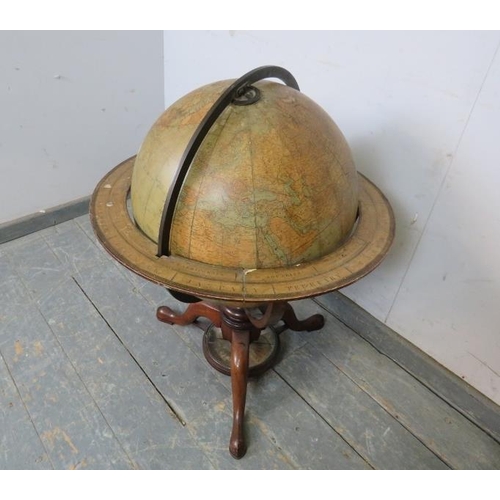 711 - An unrestored 19th century 18” terrestrial library globe by Charles Smith & Son of London, comprised... 