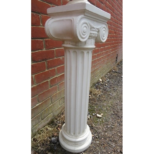 720 - A reconstituted marble bust in the Classical taste modelled as Apollo Belvedere, on an Ionic column ... 