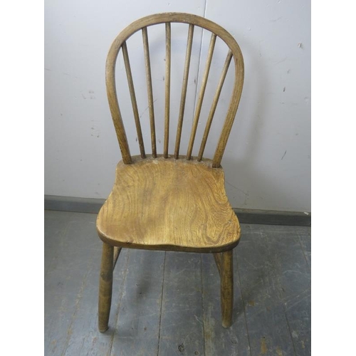 723 - Five antique elm and beech hoop-back country chairs, on canted supports with H stretchers. 
H90cm W3... 