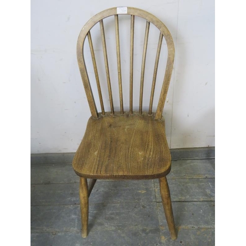 723 - Five antique elm and beech hoop-back country chairs, on canted supports with H stretchers. 
H90cm W3... 