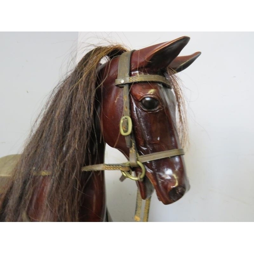 726 - A fine quality bespoke mahogany 44” rocking horse by Harold Wakefield of Boston, fitted with leather... 