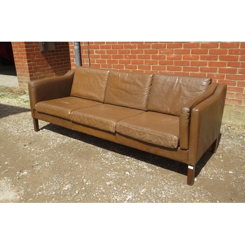 739 - A mid-century Danish 3-seater sofa in the manner of Borge Morgensen, having loose cushions upholster... 