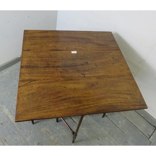 741 - A George III mahogany spider leg table, on turned supports with stretchers. 
H72cm W28-77cm D76cm (a... 