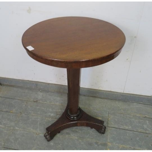 743 - A Regency Period mahogany circular wine table, the tapered hexagonal pedestal on a triform base with... 