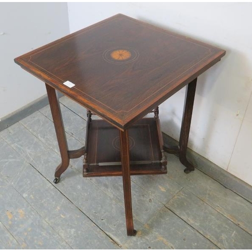 762 - An Edwardian rosewood two-tier occasional table, crossbanded in walnut and strung with boxwood and e... 