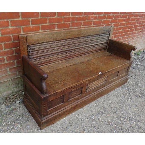 781 - A 19th century country oak settle, incorporating 18th century, possibly earlier, linen fold panels, ... 