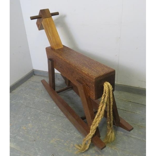 793 - A bespoke cubist rocking horse constructed using a variety of specimen hardwoods, with braided rope ... 