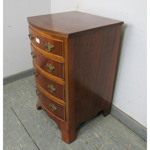 799 - A diminutive mahogany bow fronted chest in the Georgian taste, the crossbanded top with reeded edge,... 