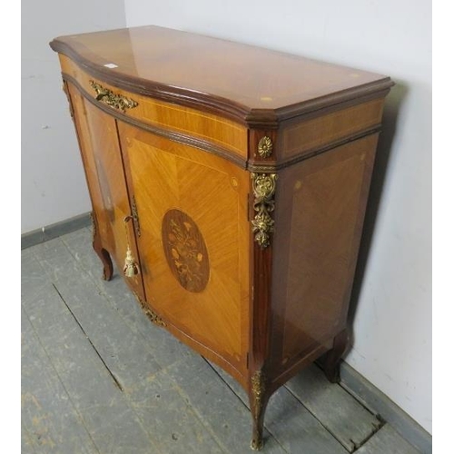 827 - A vintage French walnut and tulipwood serpentine fronted side cabinet in the 19th century taste, hav... 