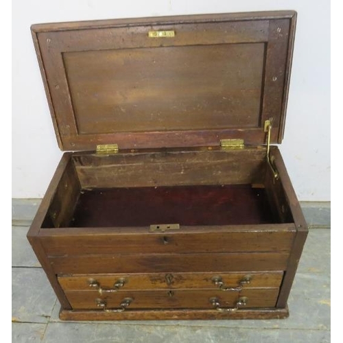 836 - A 19th century mahogany workbox, the chamfered lid opening onto a storage compartment, above two lon... 