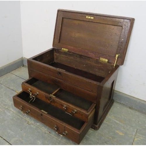 836 - A 19th century mahogany workbox, the chamfered lid opening onto a storage compartment, above two lon... 