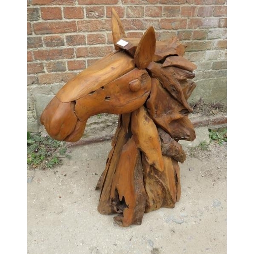 840 - A large freestanding driftwood sculpture modelled as a horse’s head. 
H87cm W70cm D30cm (approx).
Co... 