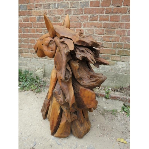 840 - A large freestanding driftwood sculpture modelled as a horse’s head. 
H87cm W70cm D30cm (approx).
Co... 