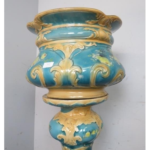 843 - A Victorian ceramic jardiniere on stand, with moulded acanthus leaf decoration, painted turquoise an... 