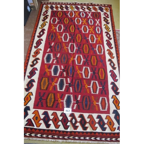 863 - South West Persian Qashqui Kilim colourful rug with repeat central patterns, predominantly red and c... 