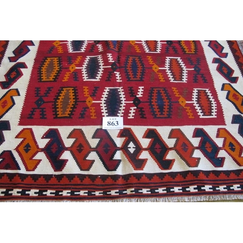 863 - South West Persian Qashqui Kilim colourful rug with repeat central patterns, predominantly red and c... 