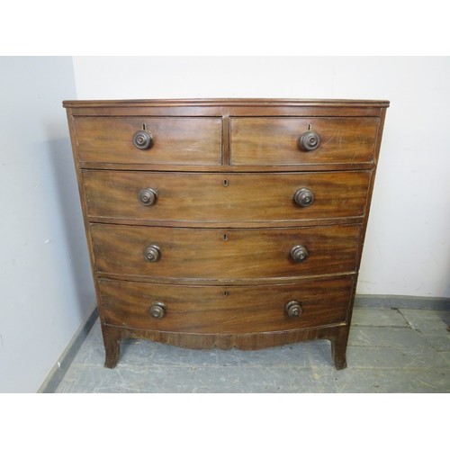 788 - A Georgian mahogany bow-fronted chest, housing two short above three long graduated cock-beaded draw... 