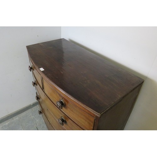 788 - A Georgian mahogany bow-fronted chest, housing two short above three long graduated cock-beaded draw... 