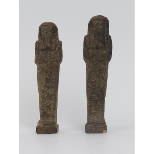 101 - Two Egyptian ushabti funerary Pharaoh figures. (2 items) 11.1 cm height, 10.5 cm height.
Condition r... 