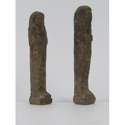 101 - Two Egyptian ushabti funerary Pharaoh figures. (2 items) 11.1 cm height, 10.5 cm height.
Condition r... 