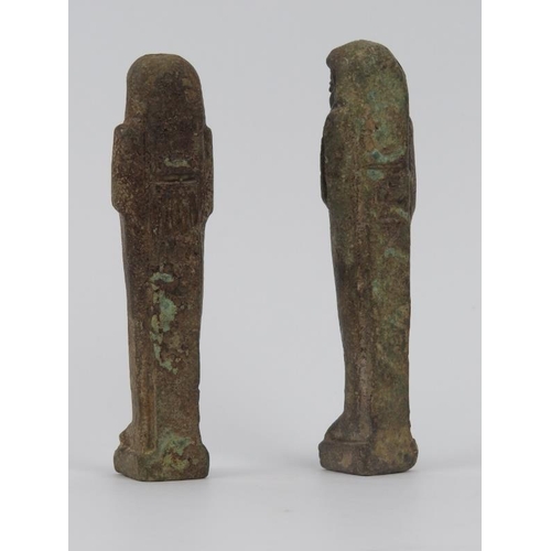 101 - Two Egyptian ushabti funerary Pharaoh figures. (2 items) 11.1 cm height, 10.5 cm height.
Condition r... 