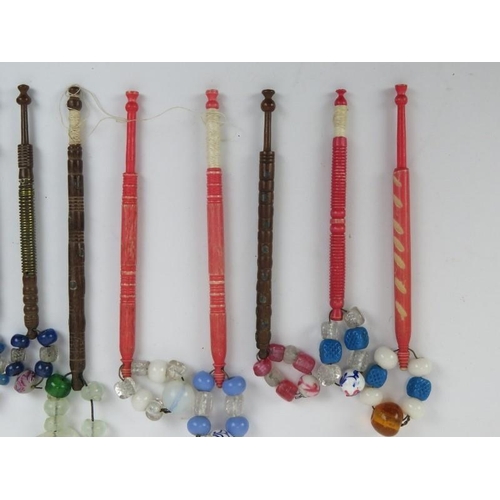 115 - A group of antique lace makers bobbins. Turned wood and stained red bone. (13 items)
Condition repor... 