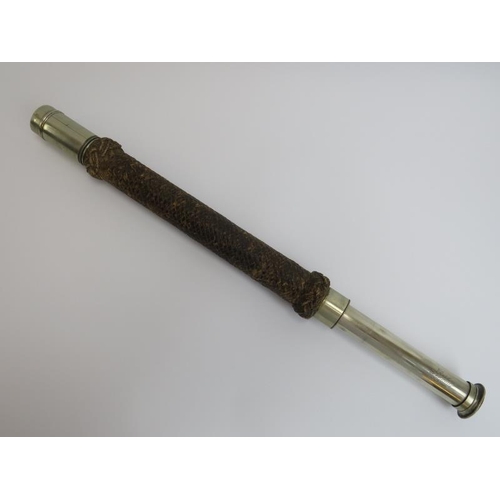 118 - A Victorian nickel plated brass telescope by Ross of London, 19th century. With a woven sleeve and e... 