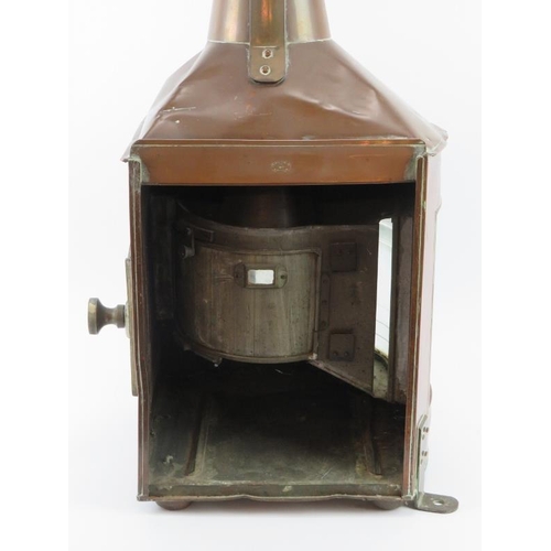 12 - A large copper and brass ship’s starboard lantern by C P Grimley & Sons of Birmingham, dated 1943. 7... 