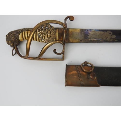 18 - A British naval officer’s sword, late 18th/early 19th century. With a lion's head pommel, white ivor... 