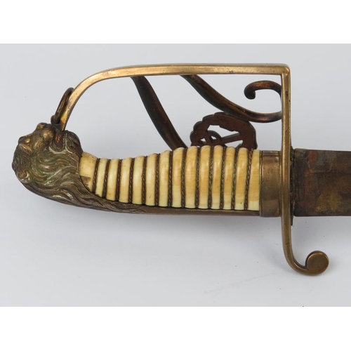 18 - A British naval officer’s sword, late 18th/early 19th century. With a lion's head pommel, white ivor... 