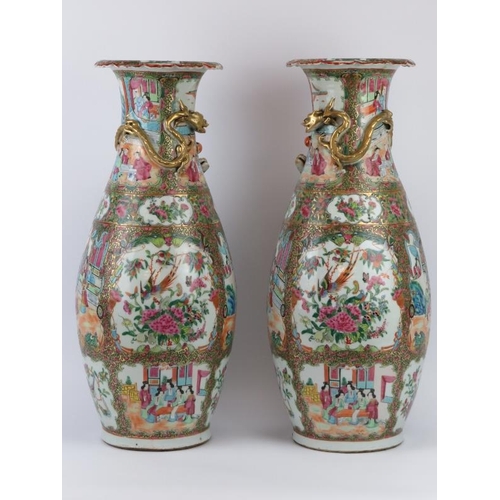 22 - A large pair of Chinese famille rose medallion enamelled porcelain vases, Canton, mid 19th century. ... 