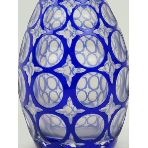 25 - A Bohemian clear and blue overlay glass vase, late 19th/early 20th century. 30 cm height. 
Condition... 