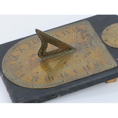 27 - A Georgian period gilt brass horological sundial with gnomon, dated 1714. The sundial and Romam nume... 