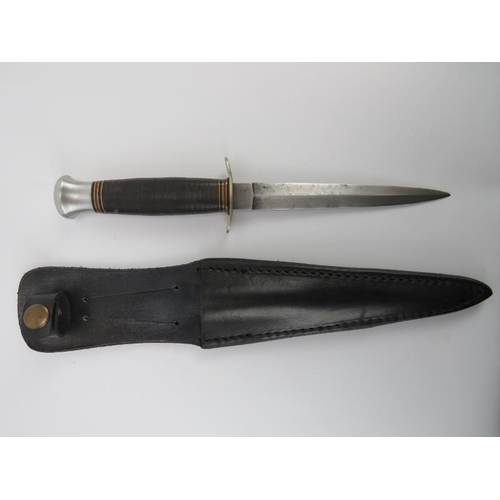 44 - Militaria: A British ‘I cut my way’ commando dagger by William Rodgers. Black leather sheath possibl... 