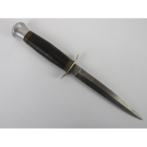 44 - Militaria: A British ‘I cut my way’ commando dagger by William Rodgers. Black leather sheath possibl... 