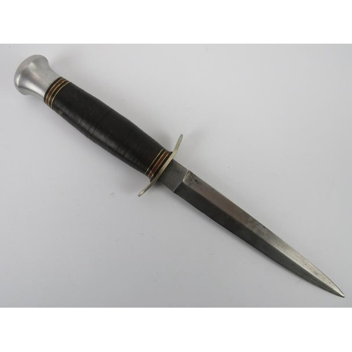 44 - Militaria: A British ‘I cut my way’ commando dagger by William Rodgers. Black leather sheath possibl... 