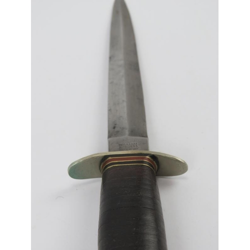 44 - Militaria: A British ‘I cut my way’ commando dagger by William Rodgers. Black leather sheath possibl... 