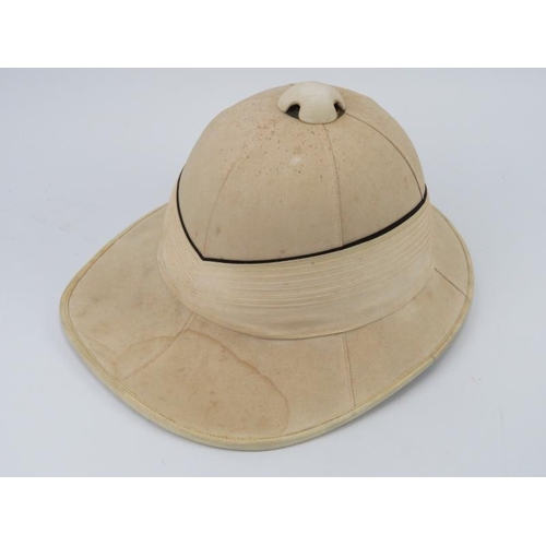 48 - A British Royal Letters patent pith helmet by EJ Whitaker of Chatham and a painted toleware metal ha... 