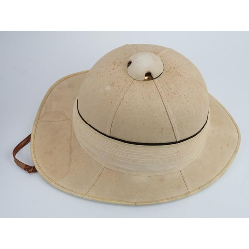 48 - A British Royal Letters patent pith helmet by EJ Whitaker of Chatham and a painted toleware metal ha... 