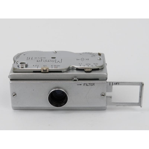 54 - A Mamiya Super 16 Sub miniature camera. With brown leather case. 
Condition report: Light age relate... 