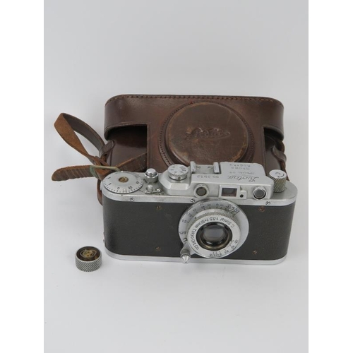 55 - A Leotax Special DII Showa Kogaku camera, circa 1947. With brown leather case. Serial number 3932. T... 